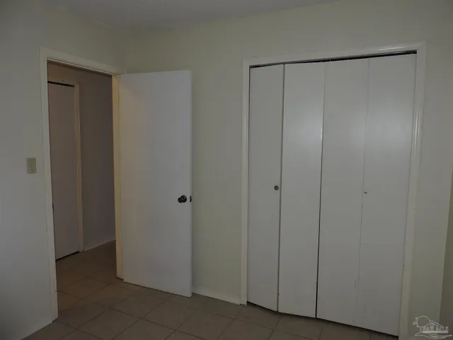 a bathroom with a sink vanity and mirror