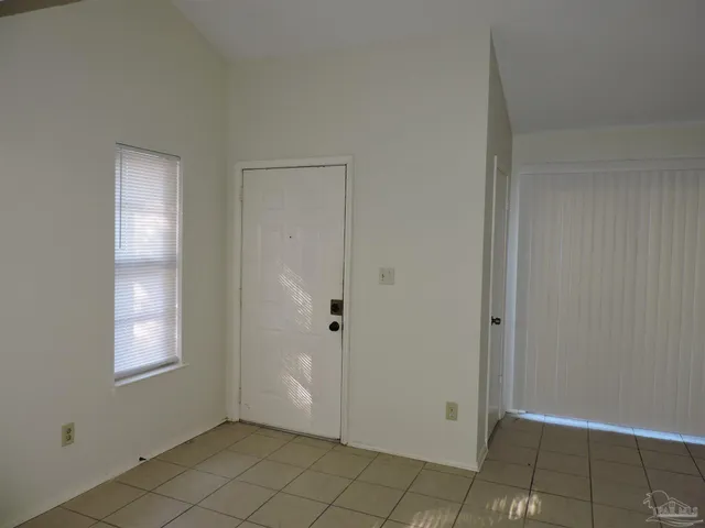 a view of an empty room with window