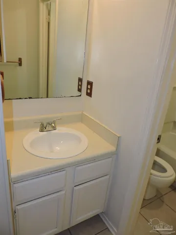a bathroom with a shower and a bath tub