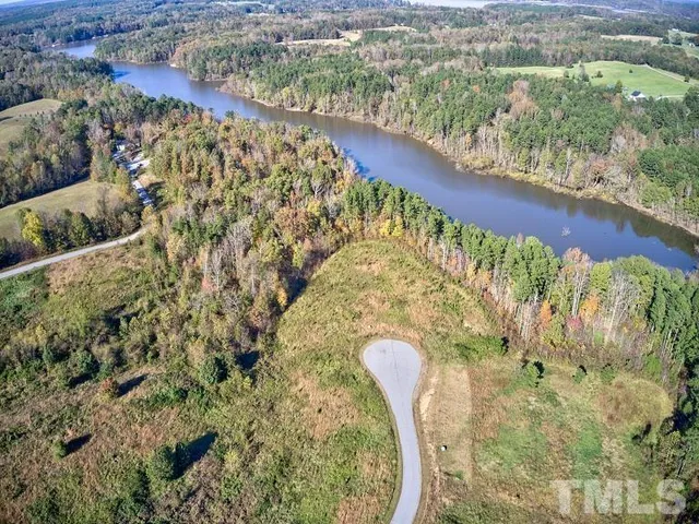 a view of swimming pool from a balcony