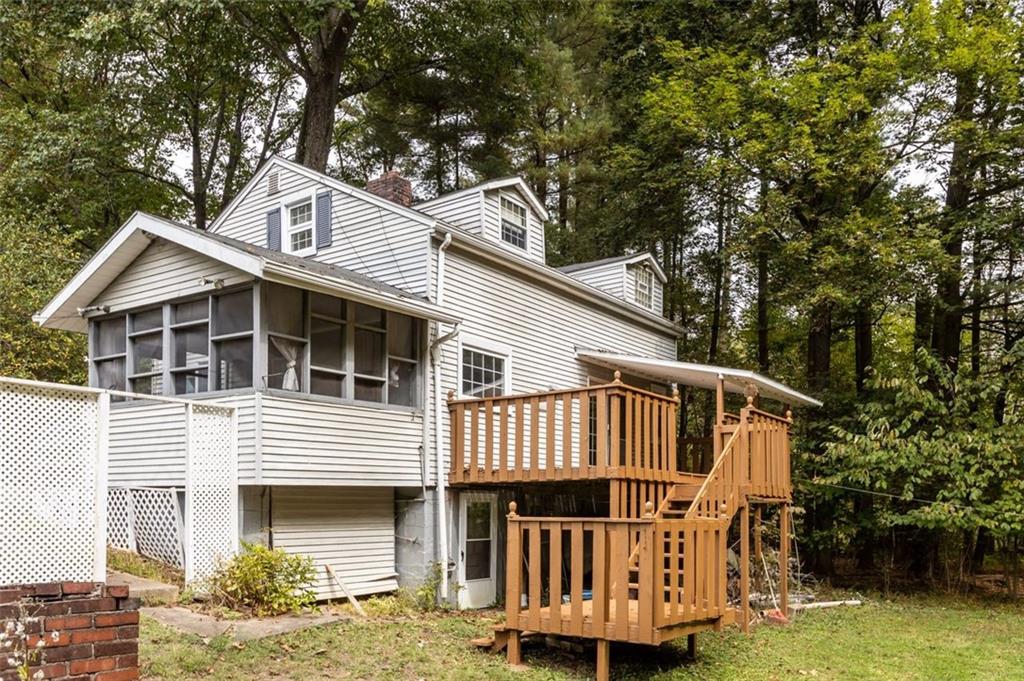 5879 Steele Road Murrysville, PA 15668 - Photo 4 of 27 a front view of a house with a balcony