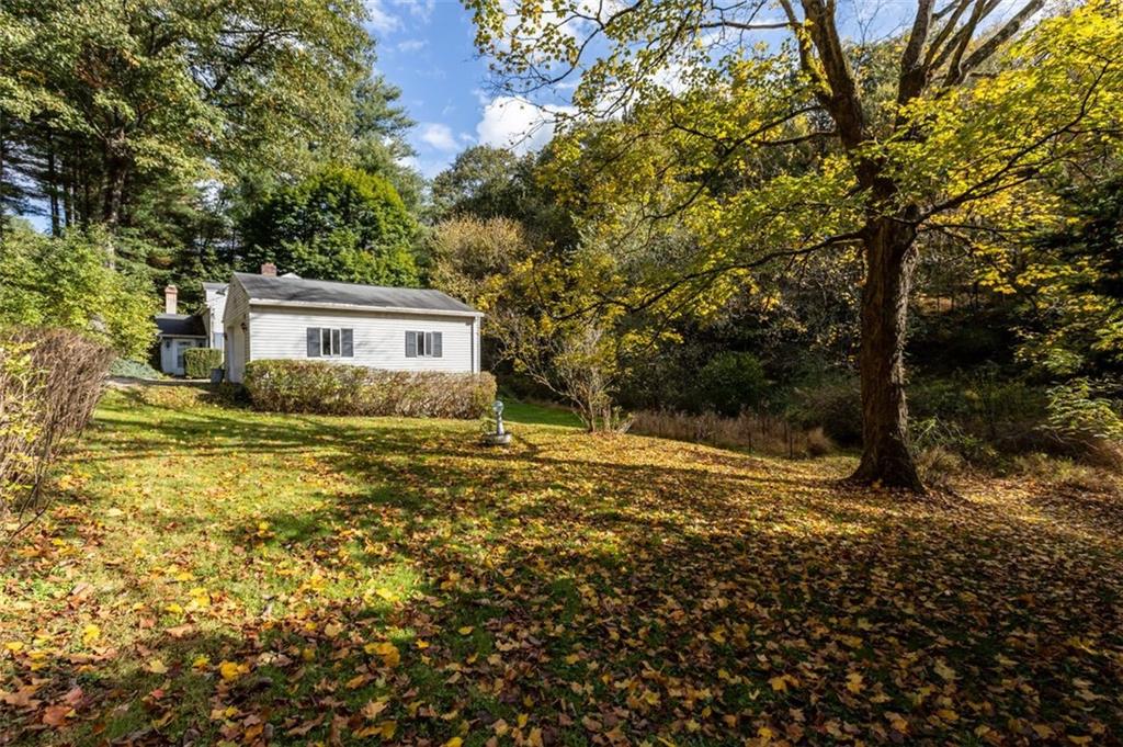 5879 Steele Road Murrysville, PA 15668 - Photo 5 of 27 a house with a yard