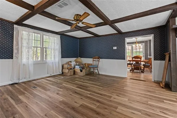 a room with furniture and a large window