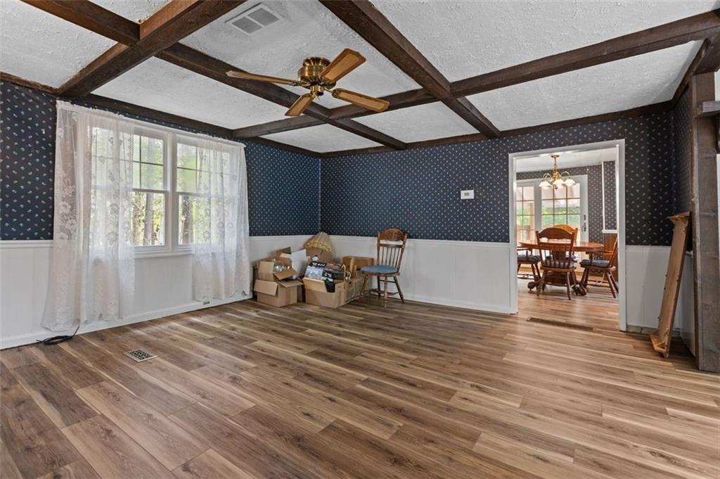 5879 Steele Road Murrysville, PA 15668 - Photo 8 of 27 a room with furniture and a large window