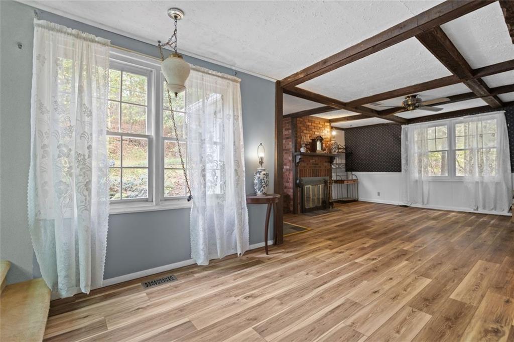 5879 Steele Road Murrysville, PA 15668 - Photo 9 of 27 a view of an empty room with a window