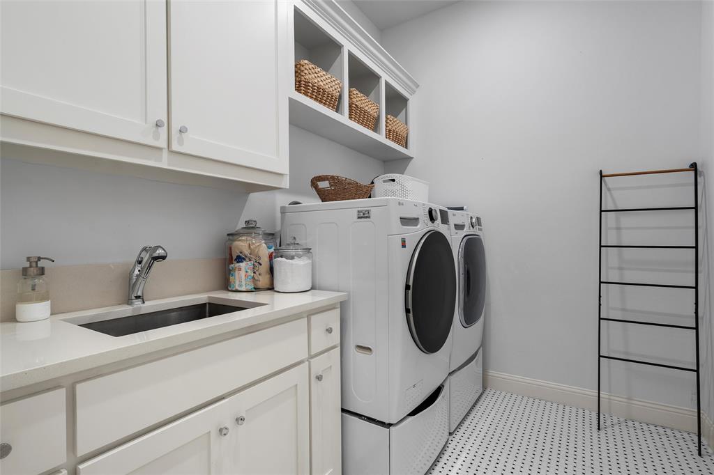 12014 Kenai Circle Woodway, TX 76712 - Photo 17 of 39 a utility room with sink dryer and washer