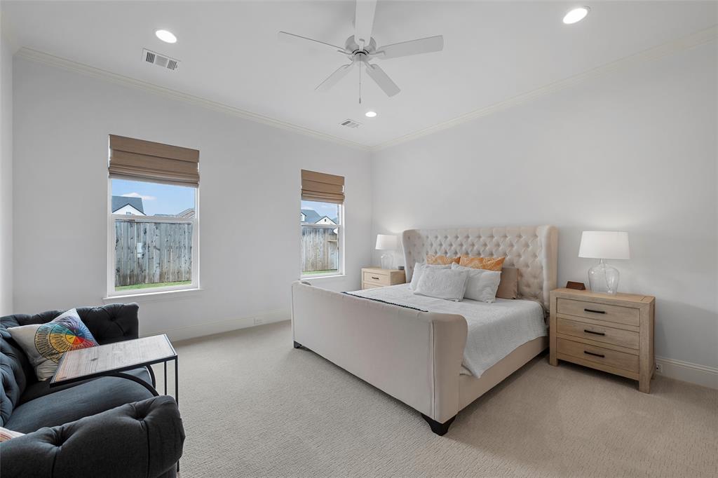 12014 Kenai Circle Woodway, TX 76712 - Photo 18 of 39 a bed room with a bed and a couch