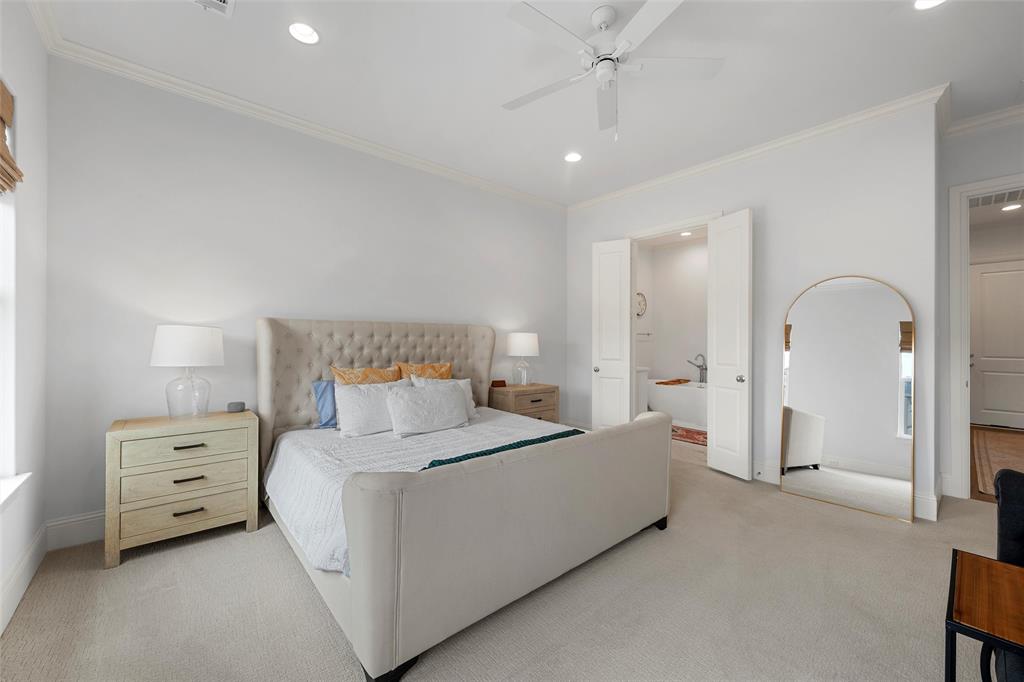 12014 Kenai Circle Woodway, TX 76712 - Photo 19 of 39 a bedroom with a bed and a night stand