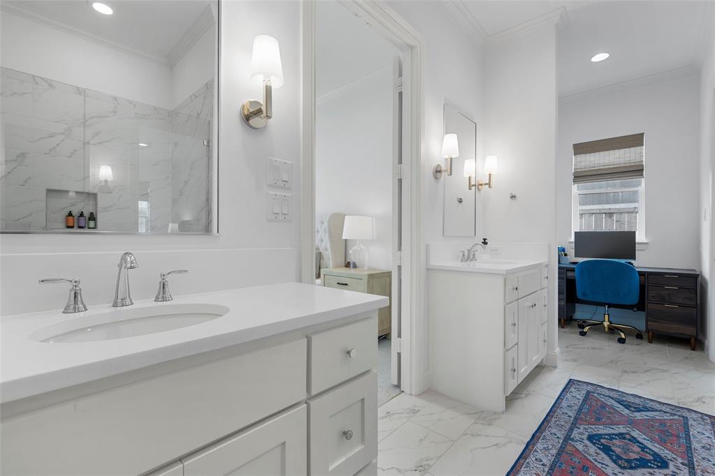 12014 Kenai Circle Woodway, TX 76712 - Photo 20 of 39 a bathroom with a sink double vanity and a mirror