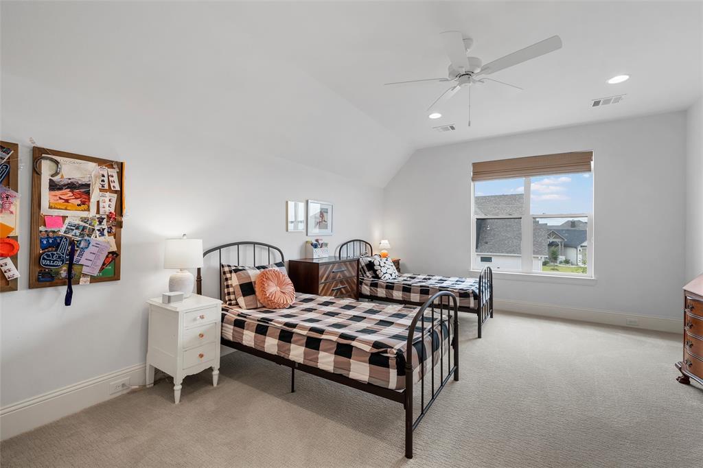 12014 Kenai Circle Woodway, TX 76712 - Photo 28 of 39 a bedroom with furniture and a window