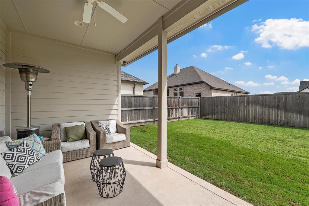 12014 Kenai Circle Woodway, TX 76712 - Photo 33 of 39 a view of backyard with seating space
