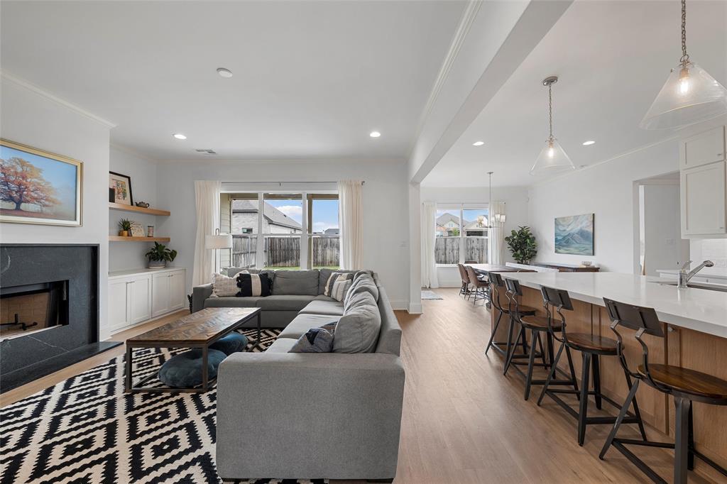 12014 Kenai Circle Woodway, TX 76712 - Photo 4 of 39 a living room with furniture and a fireplace