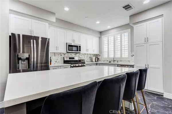 $575,000 | 625 Savi Drive, Unit 102, Corona, CA 92878