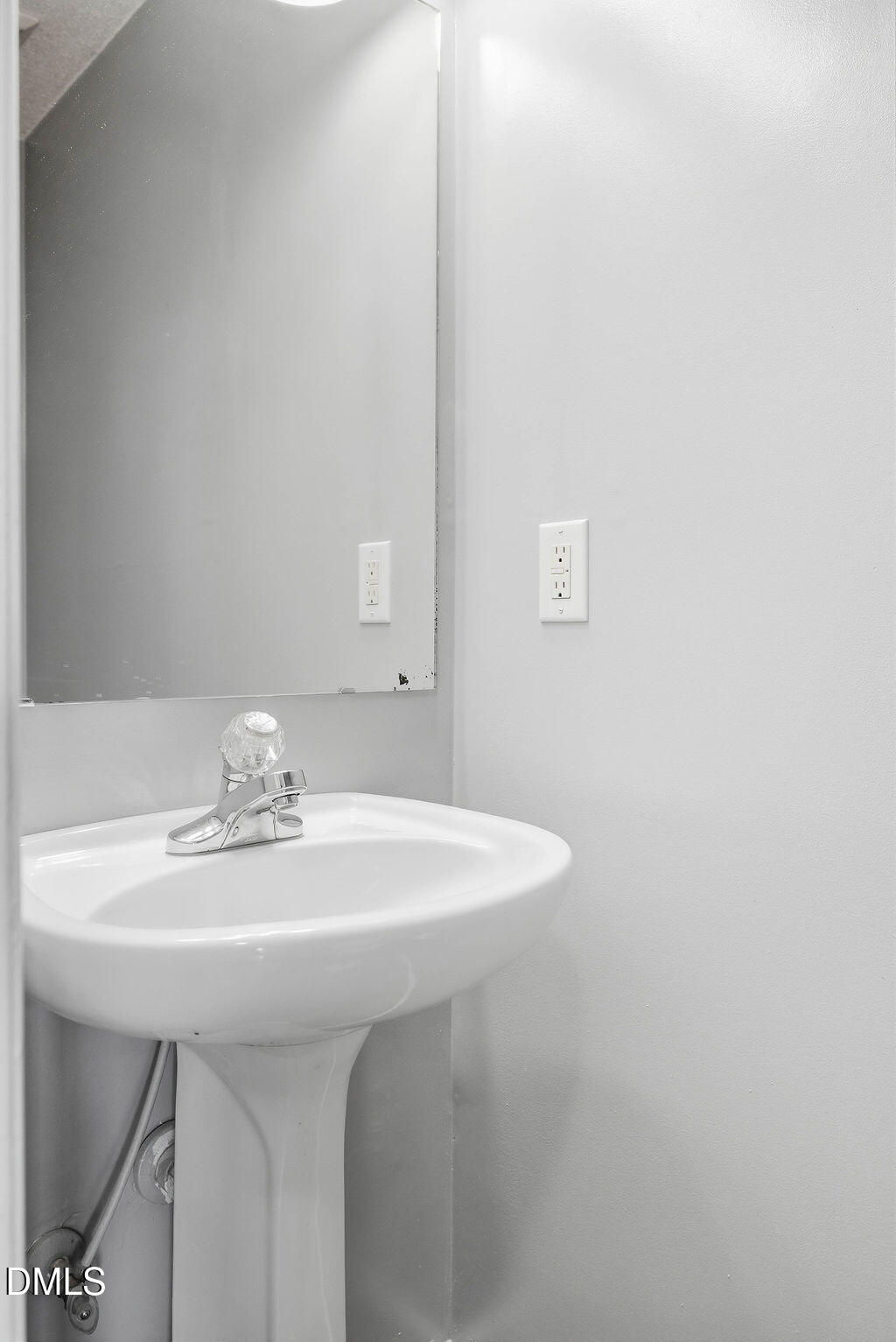 1560 Cane Mill Road Coats, NC 27521 - Photo 18 of 32 a bathroom with a sink a and mirror
