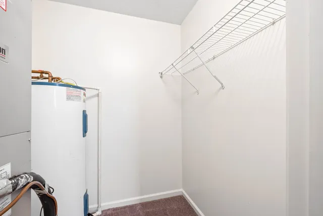 a view of a closet in a bathroom