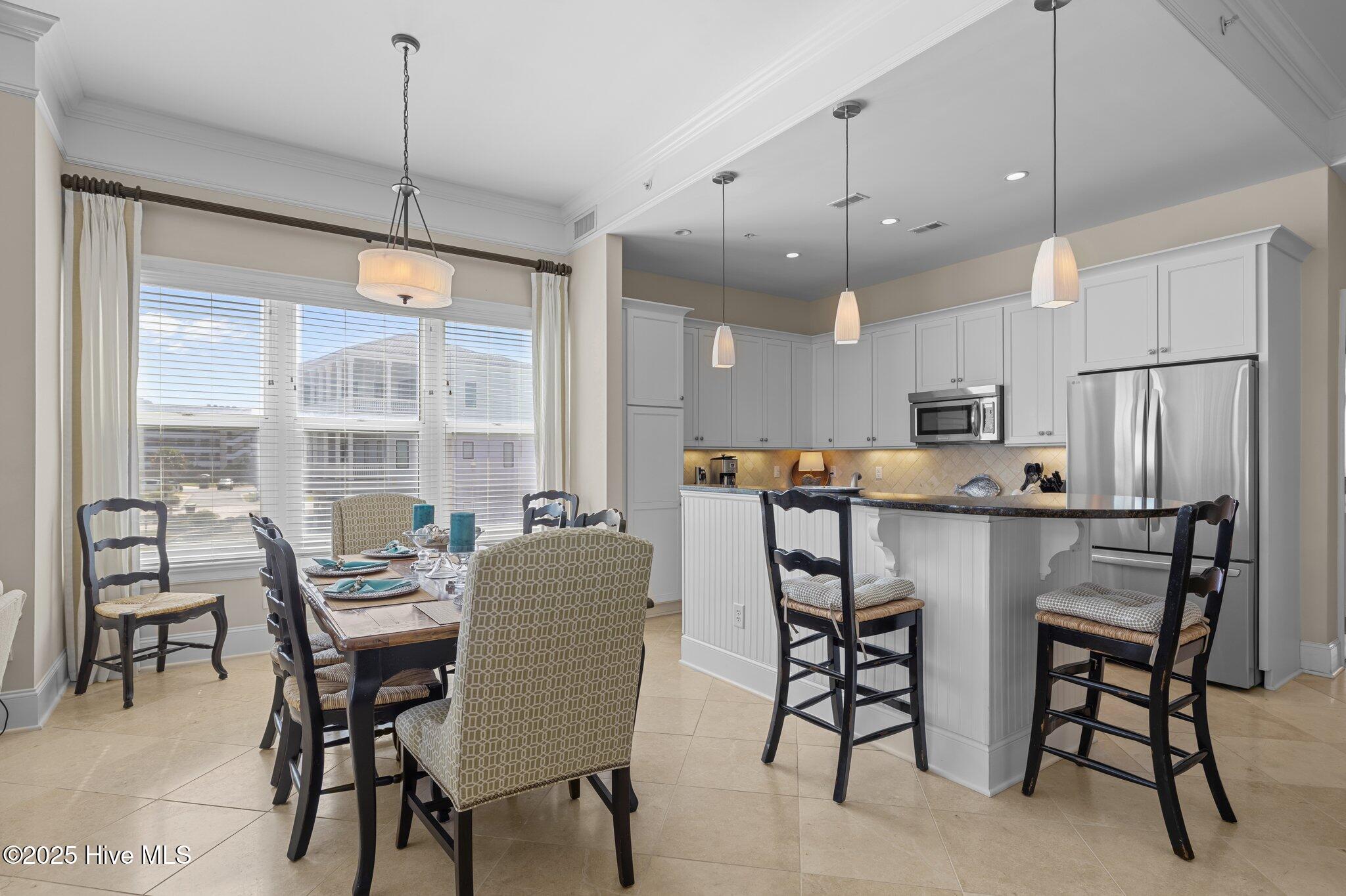 1435 Salter Path Road, Unit M1 Indian Beach, NC 28512 - Photo 8 of 62 Dining area