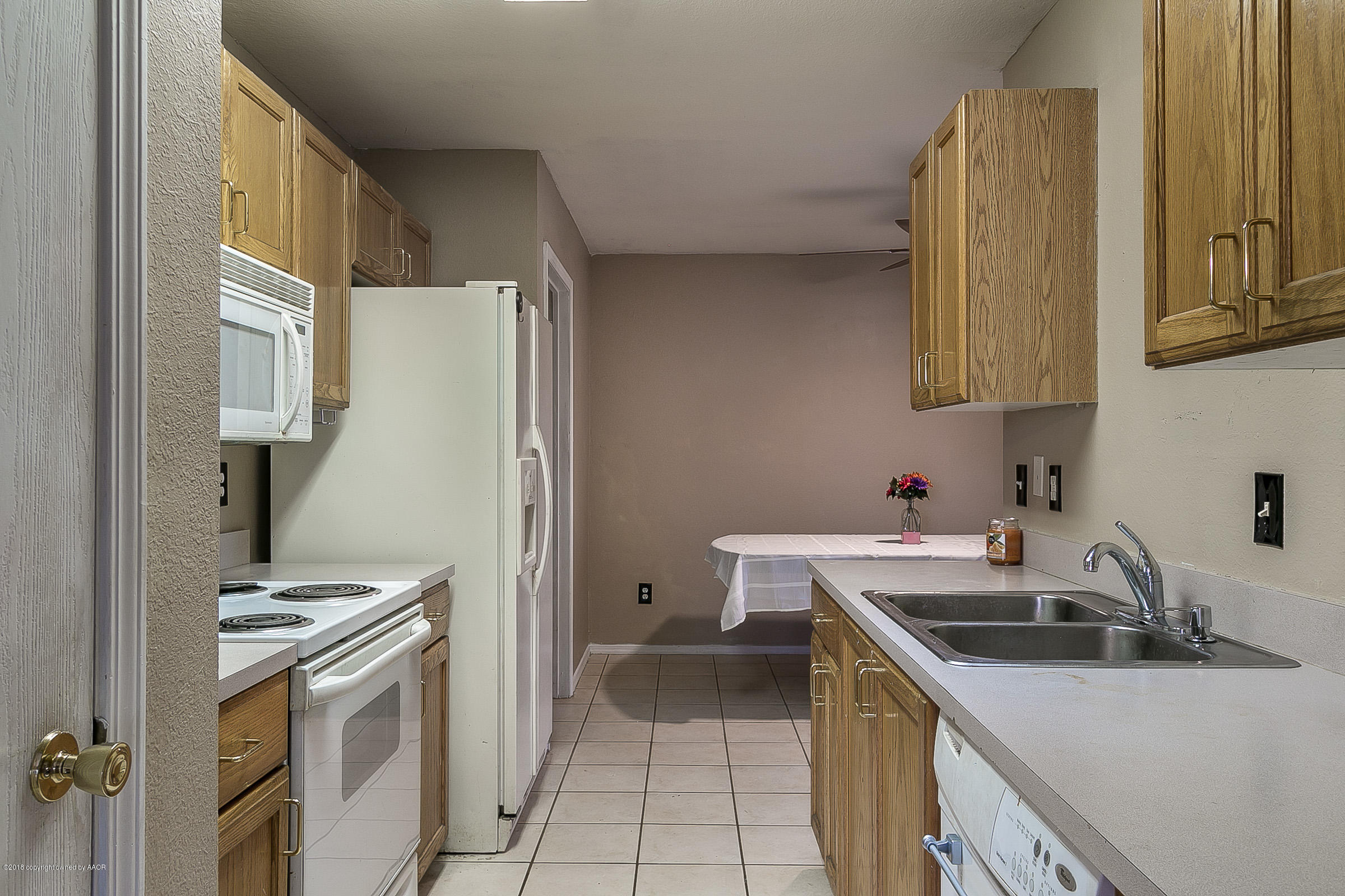 5201 Capulin Lane Amarillo, TX 79110 - Photo 4 of 14 004_Kitchen