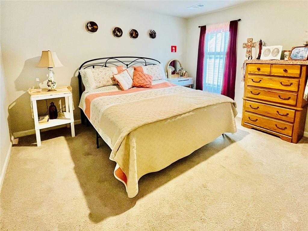 3015 Winding Ridge Waleska, GA 30183 - Photo 26 of 40 a bedroom with a bed and dresser