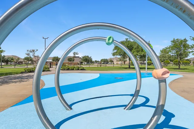 an aerial view of a house with outdoor space