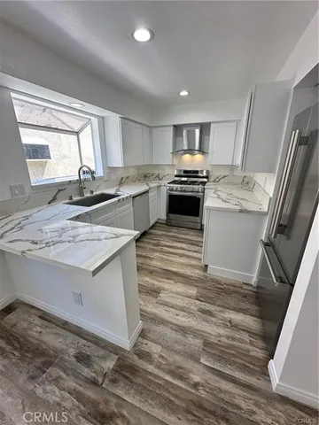 a view of a livingroom with a hardwood
