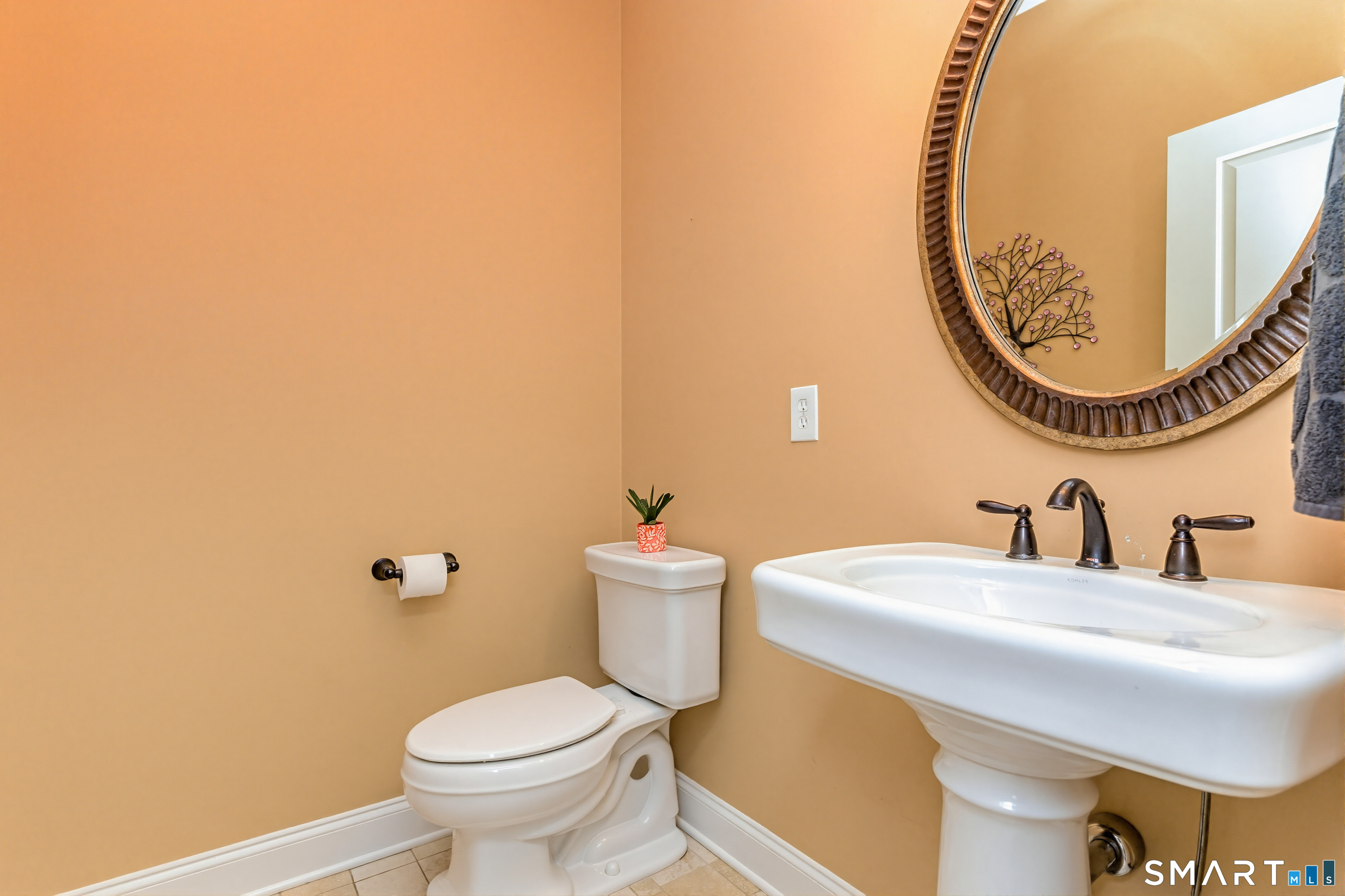 30 Block Farm Road Monroe, CT 06468 - Photo 21 of 40 a bathroom with a toilet a sink and a mirror