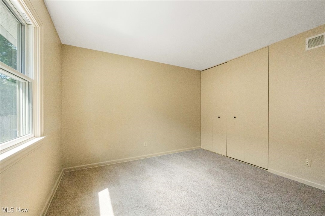 1586 Norledge Road Akron, OH 44305 - Photo 19 of 24 freshly painted warm neutral with brand new carpeting