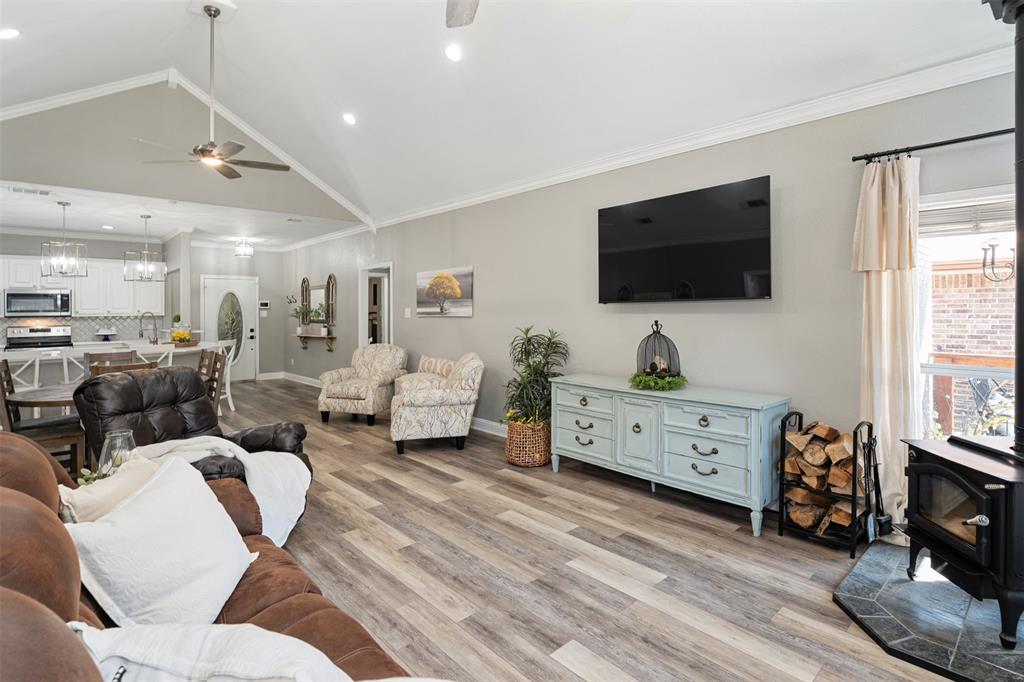 127 Rueda Encina Street Gun Barrel City, TX 75156 - Photo 16 of 39 a living room with furniture a flat screen tv and a window