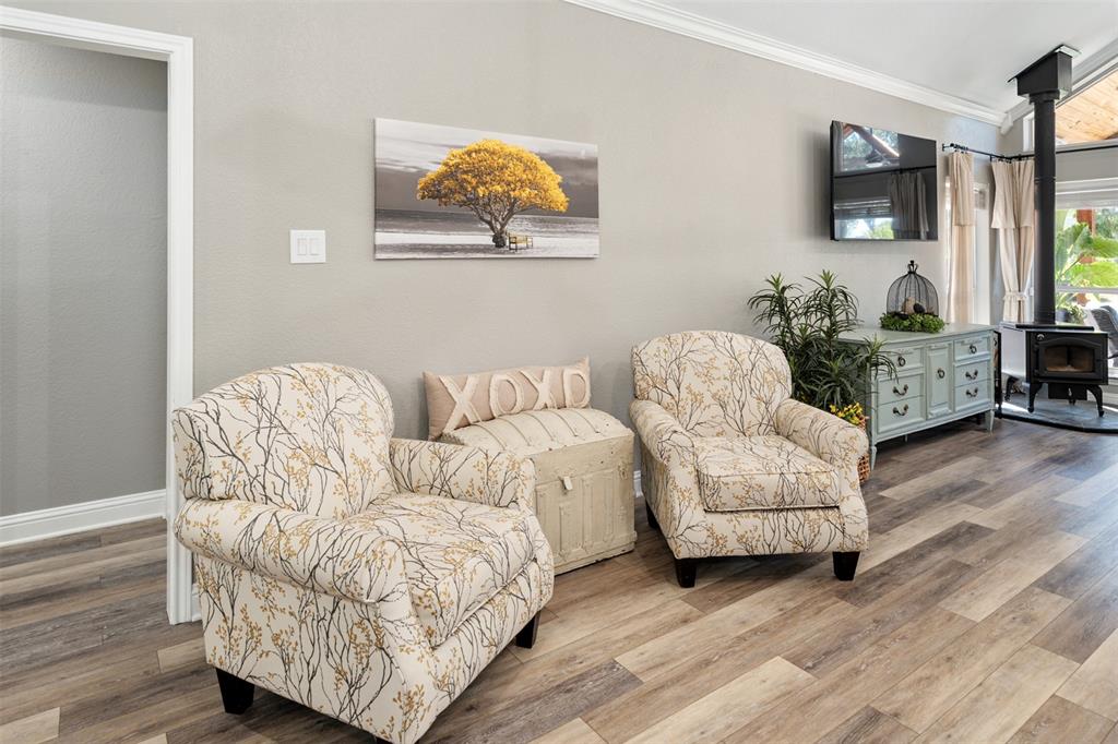 127 Rueda Encina Street Gun Barrel City, TX 75156 - Photo 19 of 39 a living room with furniture and a flat screen tv