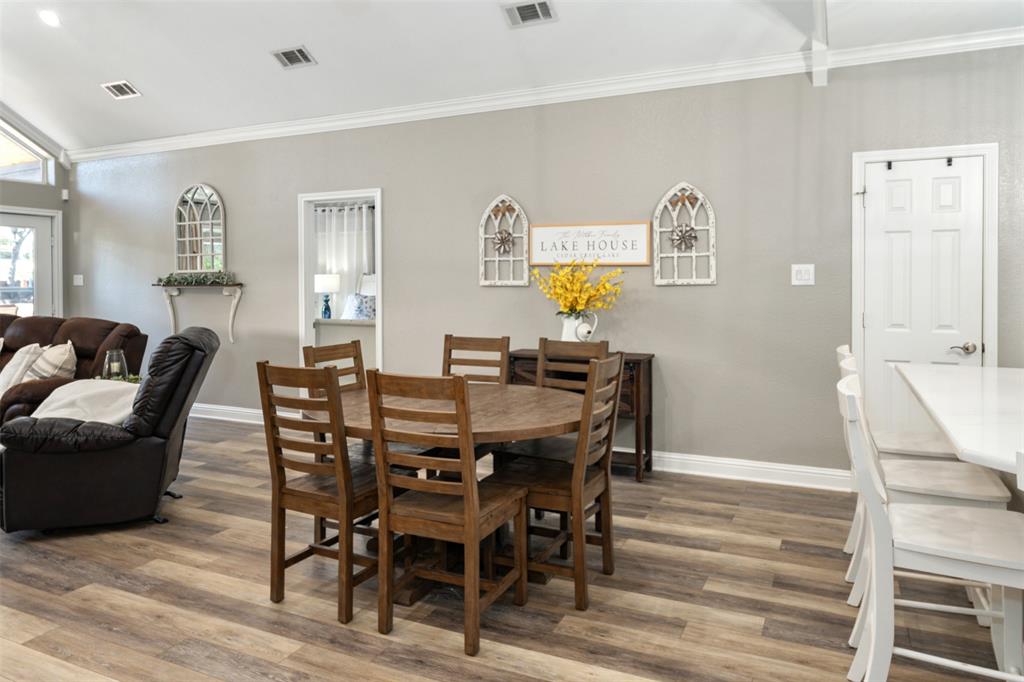 127 Rueda Encina Street Gun Barrel City, TX 75156 - Photo 21 of 39 a view of a dining room with furniture