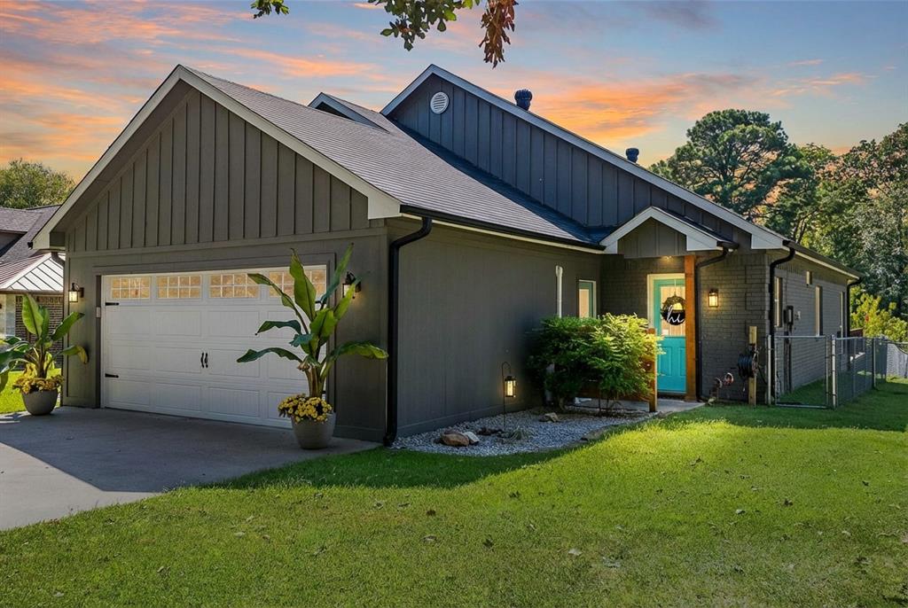 127 Rueda Encina Street Gun Barrel City, TX 75156 - Photo 3 of 39 a backyard of a house with plants and barbeque oven