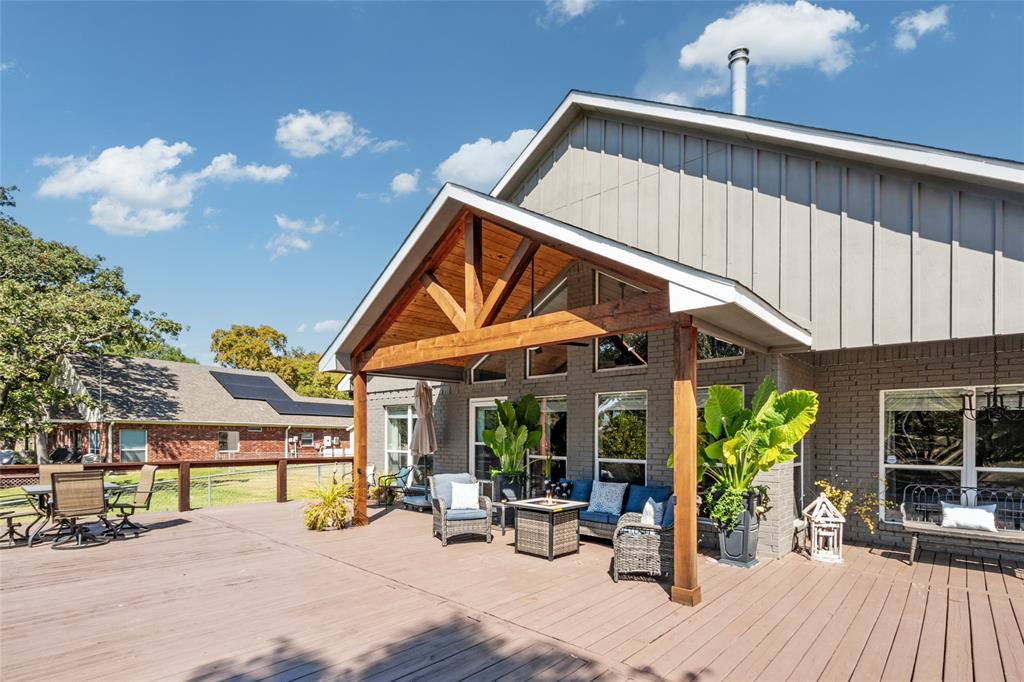 127 Rueda Encina Street Gun Barrel City, TX 75156 - Photo 33 of 39 a view of a house with sitting area and furniture