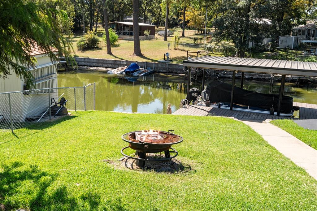 127 Rueda Encina Street Gun Barrel City, TX 75156 - Photo 36 of 39 a swimming pool with outdoor seating outdoor seating and yard