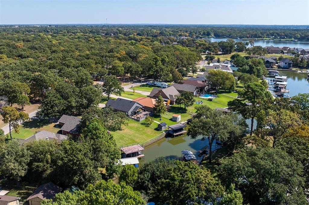 127 Rueda Encina Street Gun Barrel City, TX 75156 - Photo 4 of 39 an aerial view of residential houses with outdoor space and trees