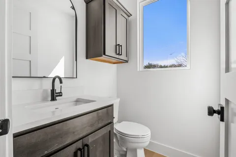 a bathroom with a sink and a toilet