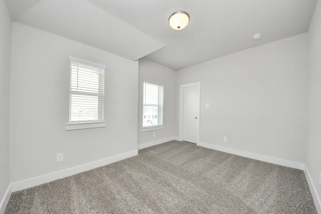 an empty room with an entryway