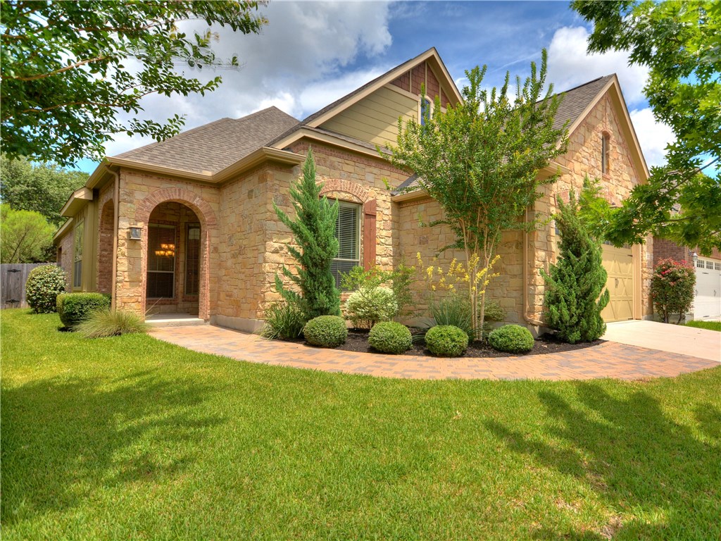 1910 Nelson Ranch Loop Cedar Park, TX 78613 - Photo 1 of 1 Family and Friends alike will love the wide pathway to your front door showcasing both your beautiful brick and stone home and manicured yard.