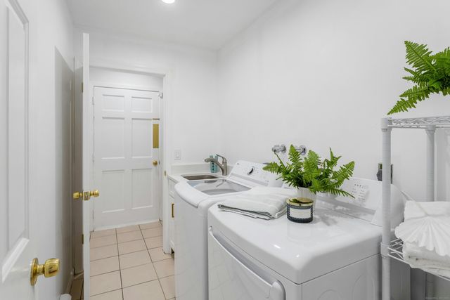 a bathroom with a sink a vanity and a mirror