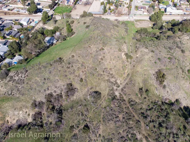 a view of a lake with a yard