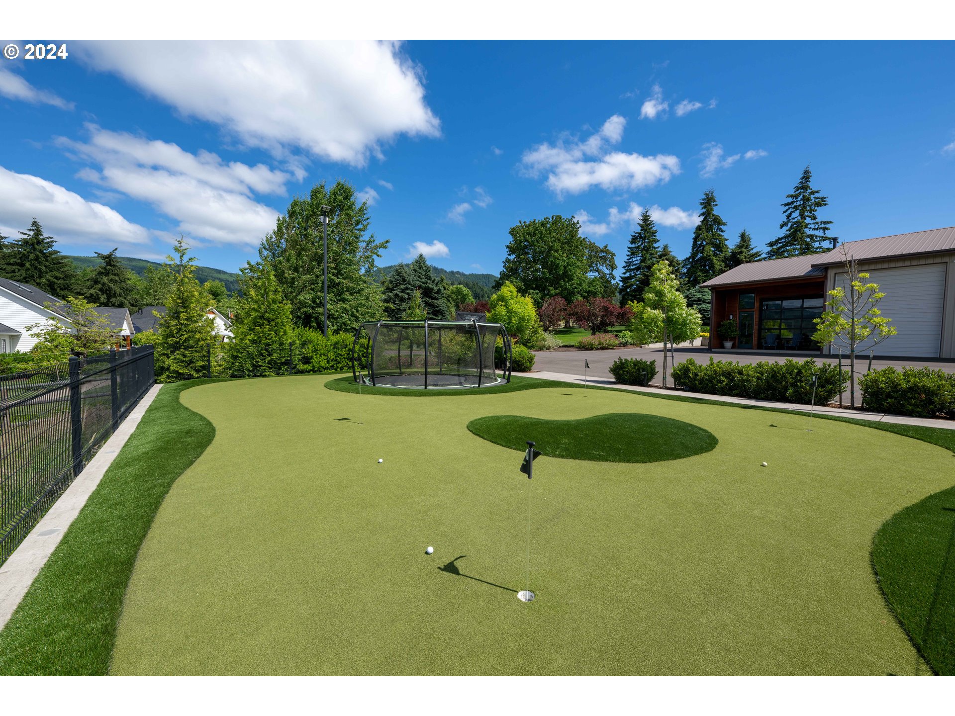 33723 Van Duyn Road Eugene, OR 97408 - Photo 12 of 48 a view of a swimming pool with a yard and plants