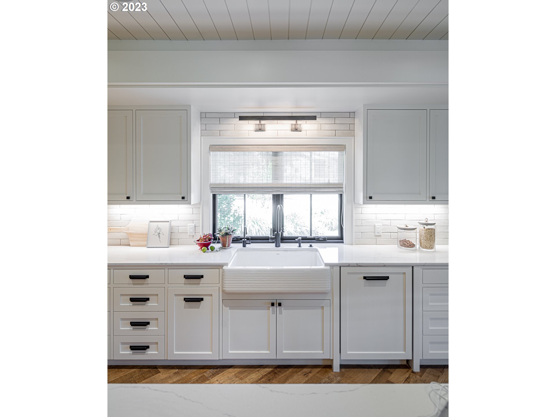 33723 Van Duyn Road Eugene, OR 97408 - Photo 10 of 48 a kitchen with granite countertop a sink and cabinets