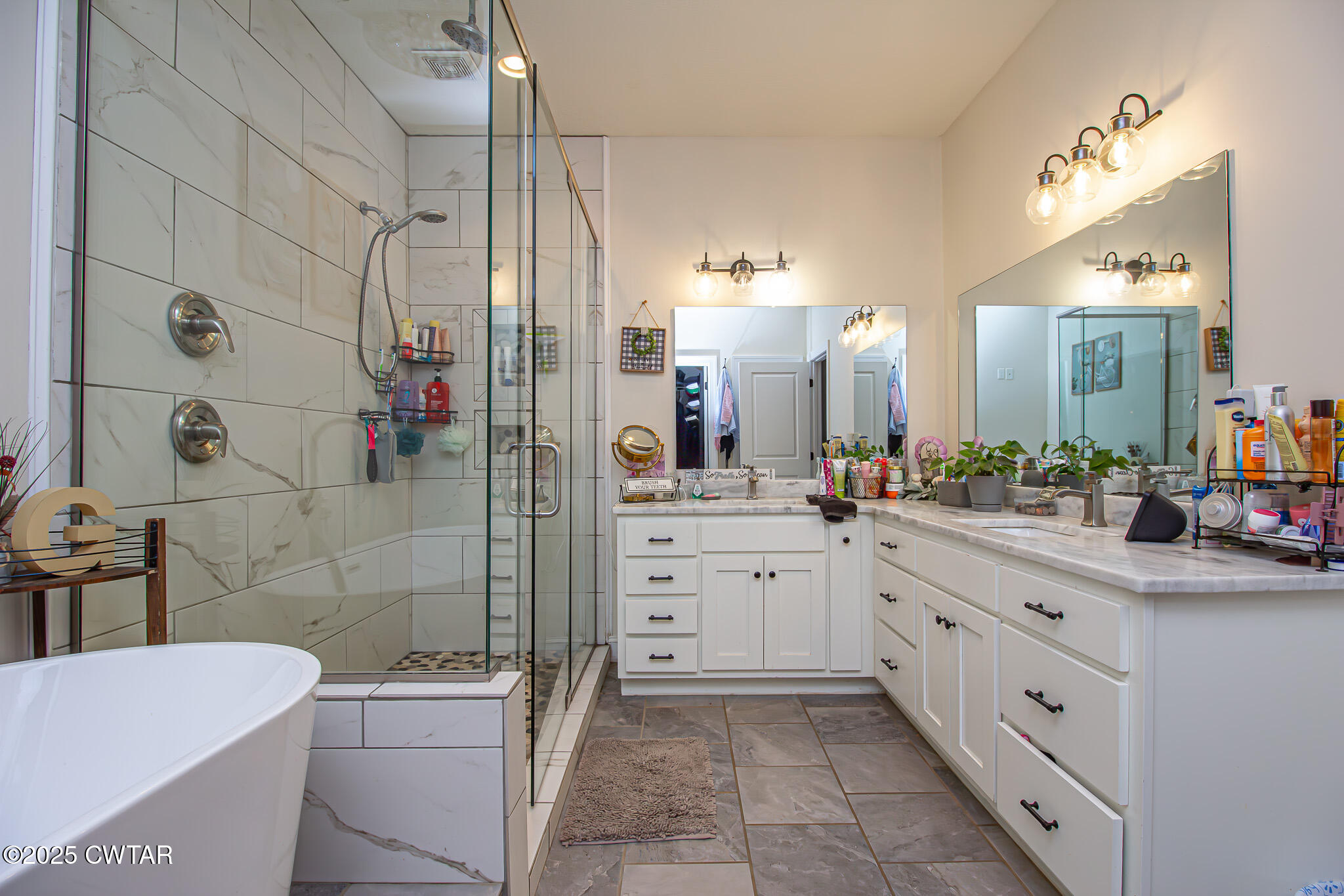 175 Ridgewood Drive Henderson, TN 38340 - Photo 19 of 43 a bathroom with a double vanity sink mirror and toilet