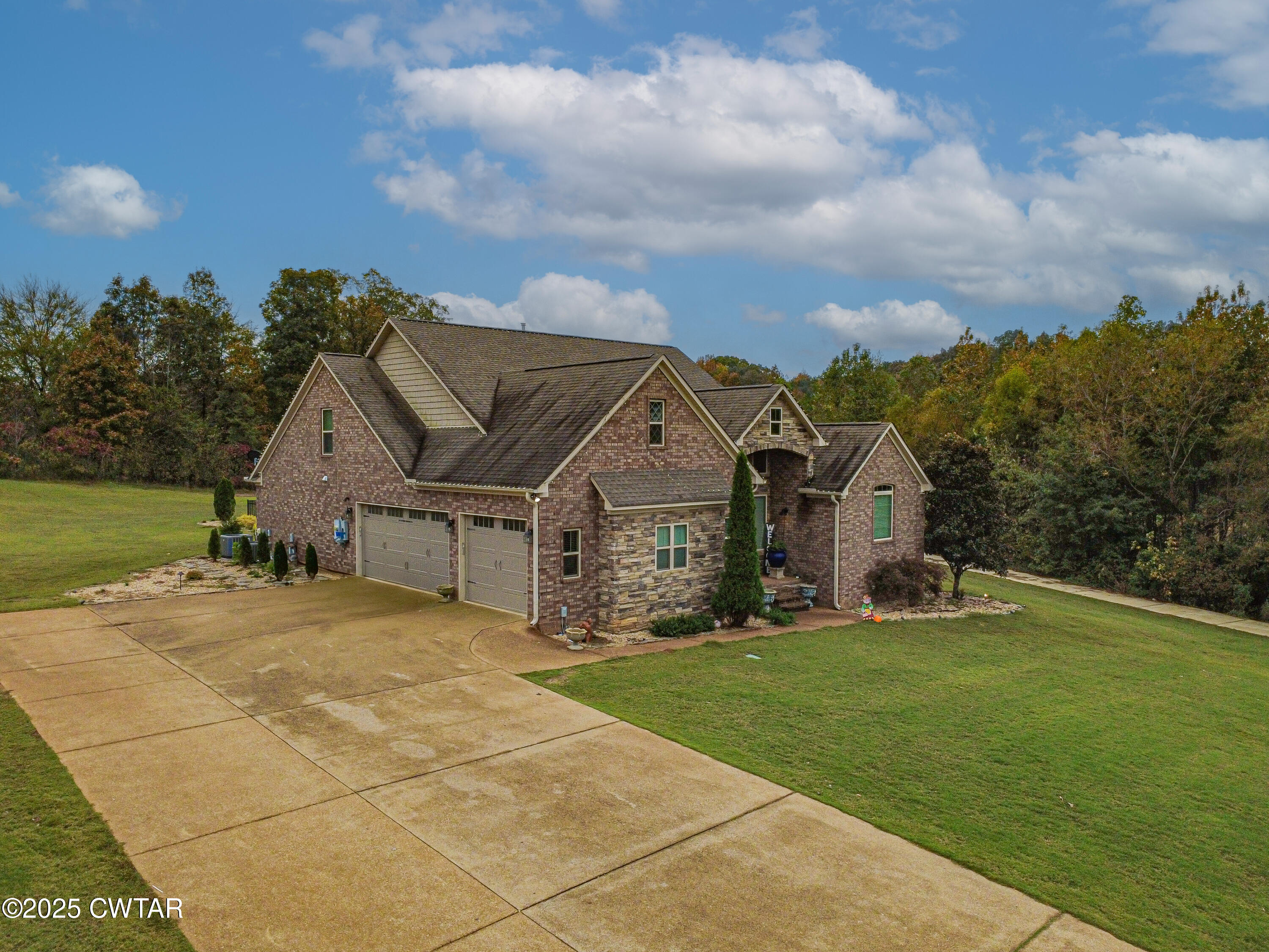 175 Ridgewood Drive Henderson, TN 38340 - Photo 3 of 43 an aerial view of a house