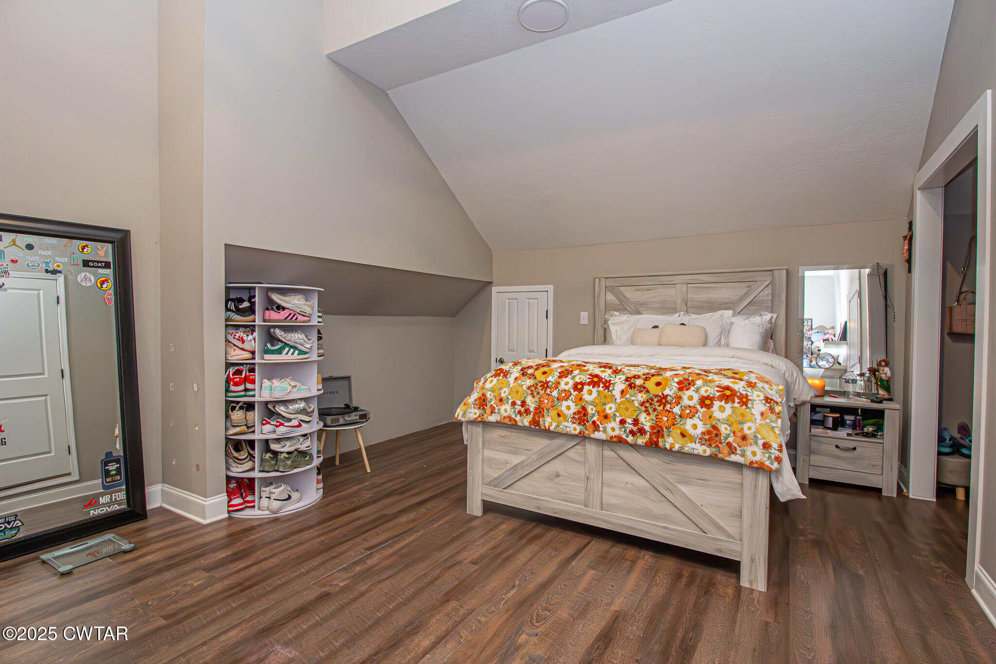 175 Ridgewood Drive Henderson, TN 38340 - Photo 31 of 43 a bed sitting in a bedroom next to a window