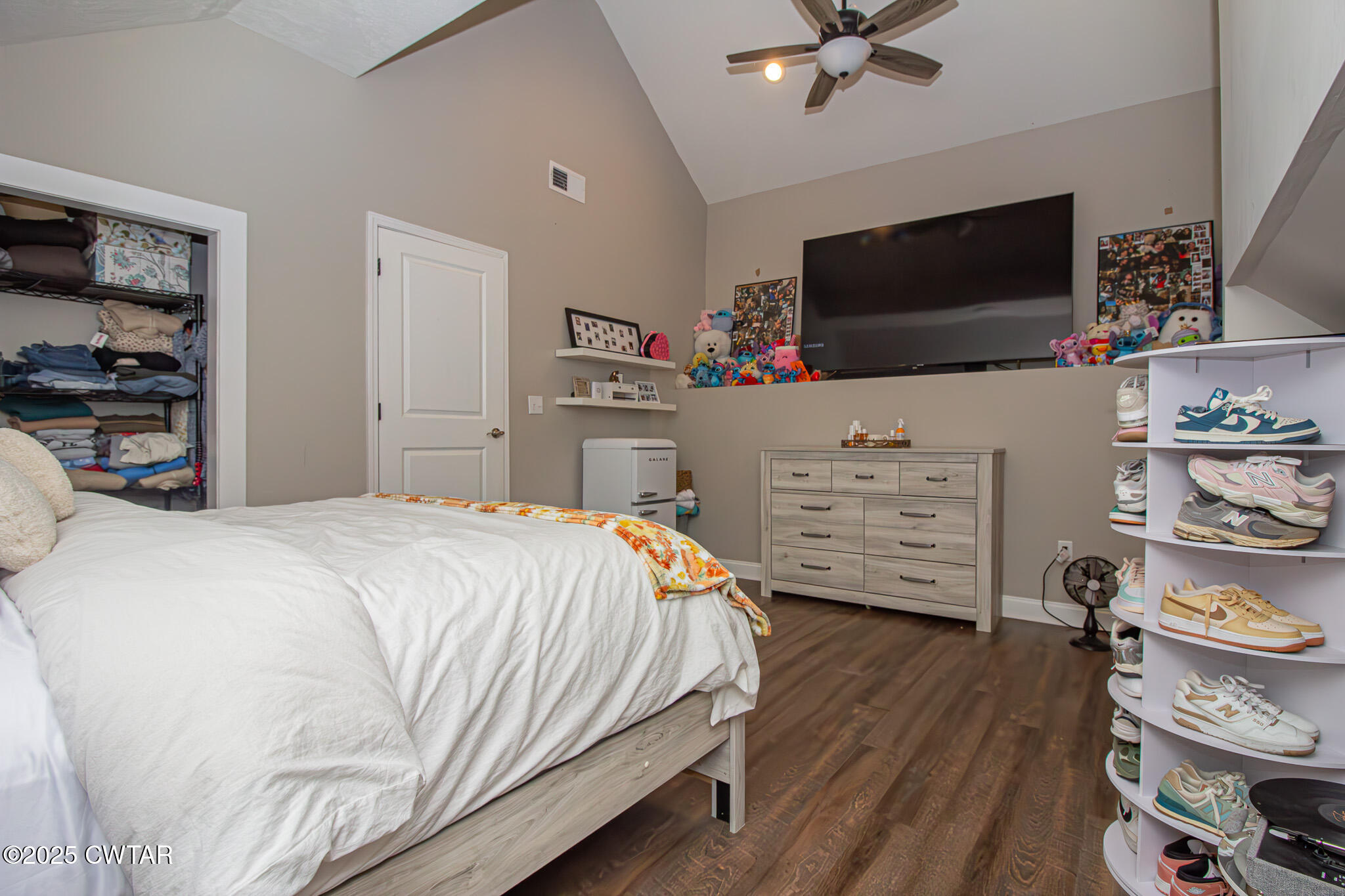 175 Ridgewood Drive Henderson, TN 38340 - Photo 32 of 43 a bedroom with a bed and flat screen tv
