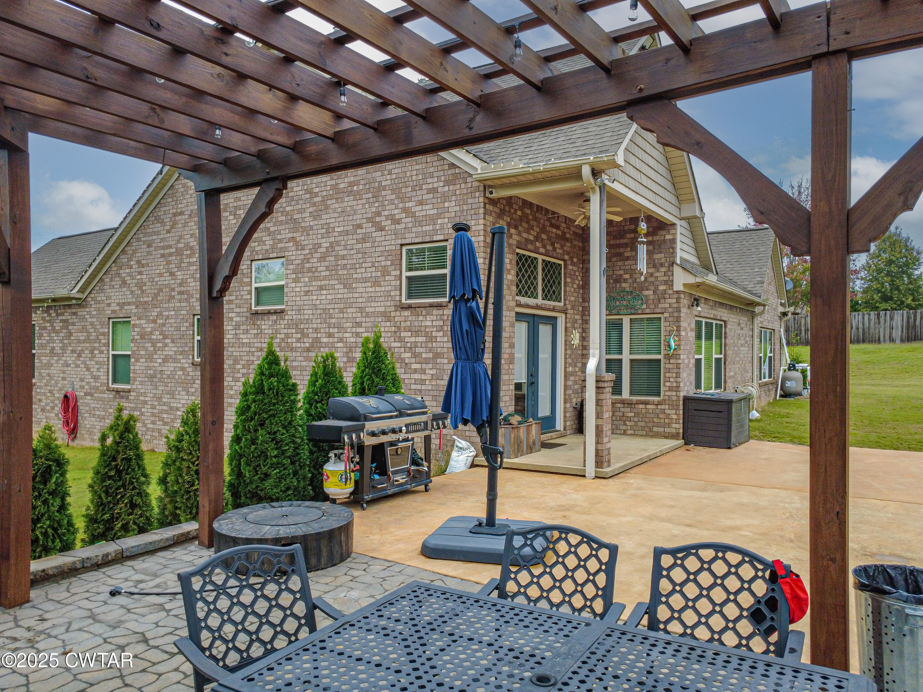 175 Ridgewood Drive Henderson, TN 38340 - Photo 34 of 43 a building outdoor space with lots of potted plants