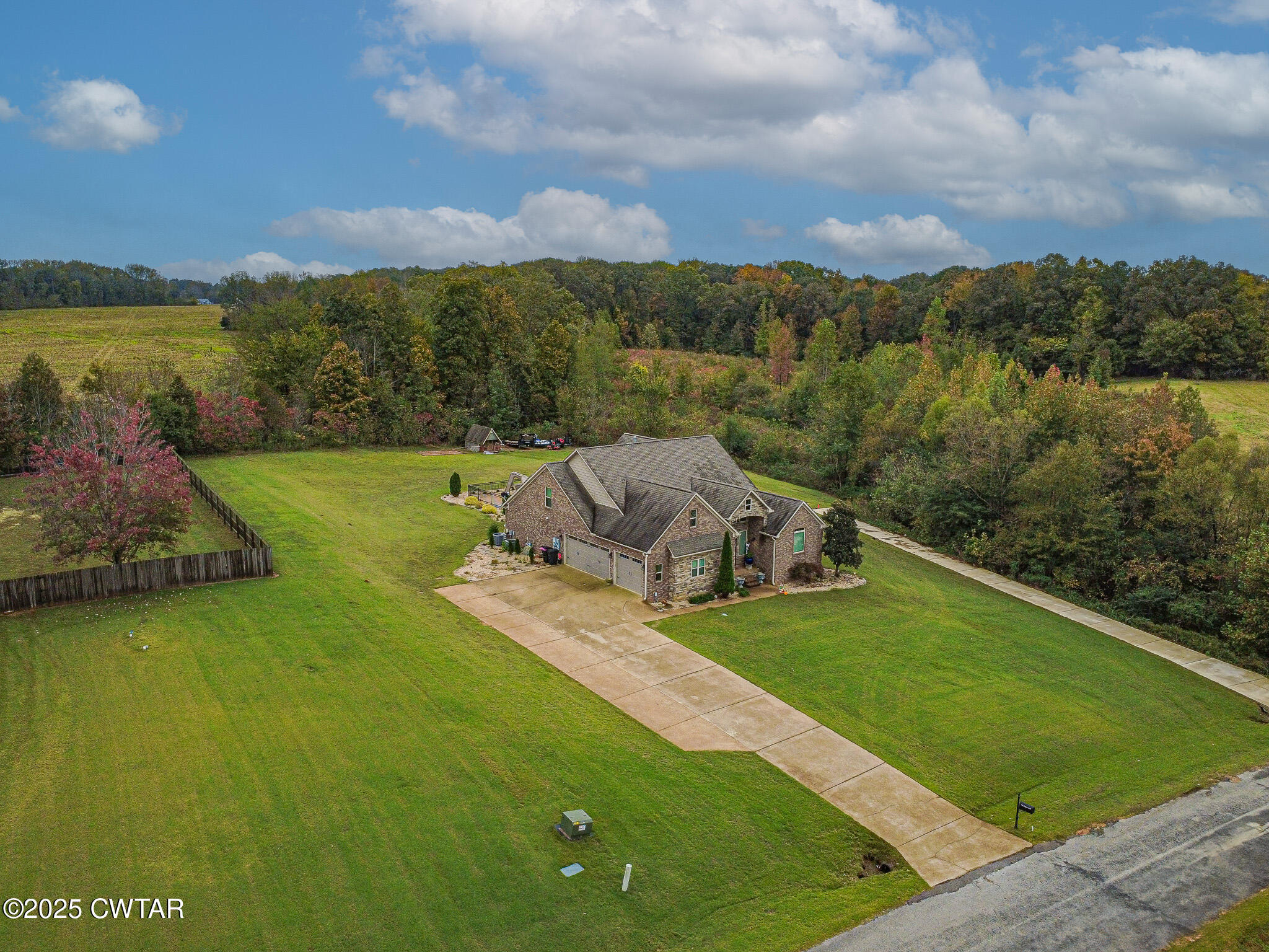 175 Ridgewood Drive Henderson, TN 38340 - Photo 4 of 43 a view of a lake with a mountain in the background