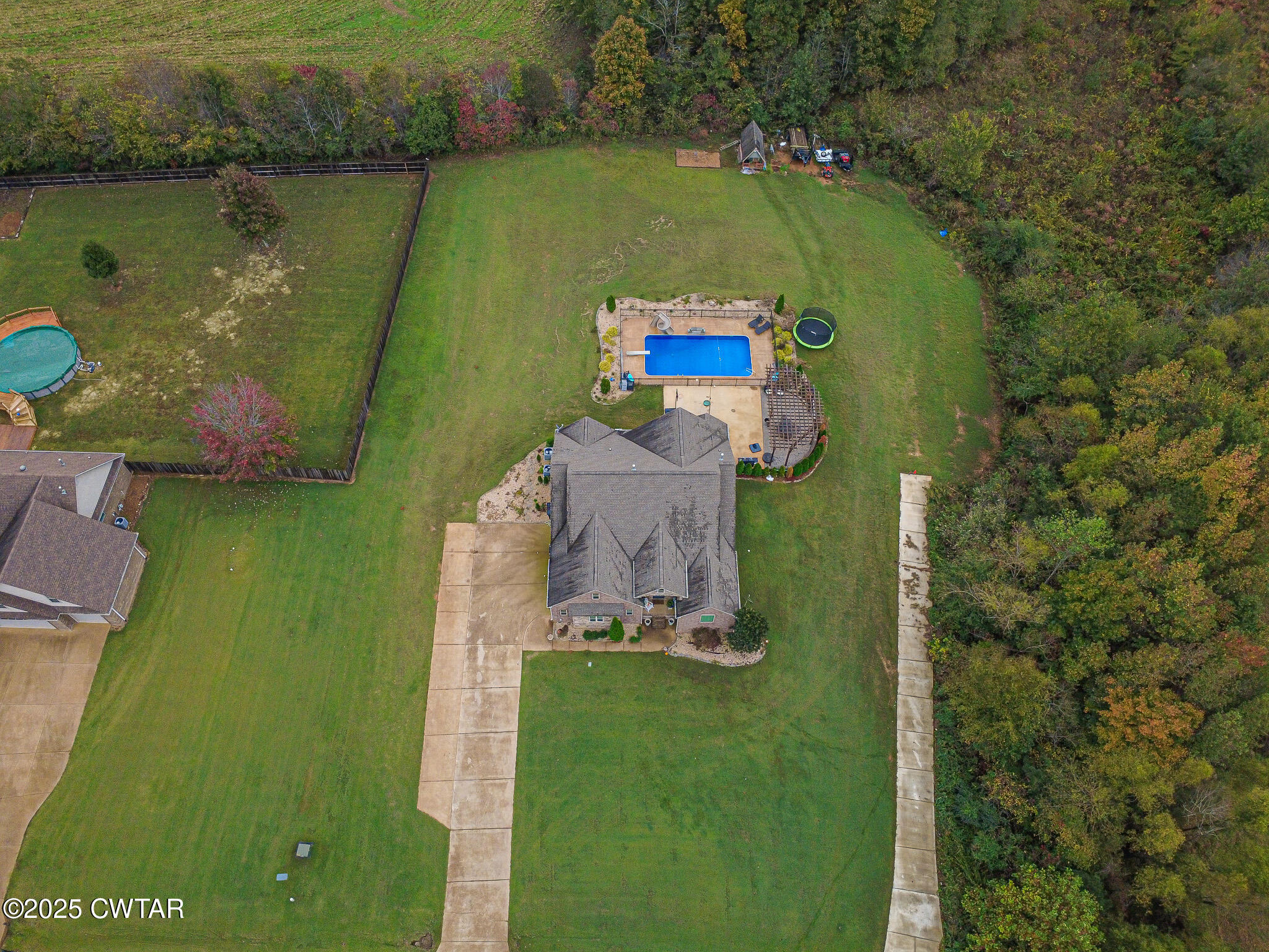 175 Ridgewood Drive Henderson, TN 38340 - Photo 41 of 43 an aerial view of a house with a lake view
