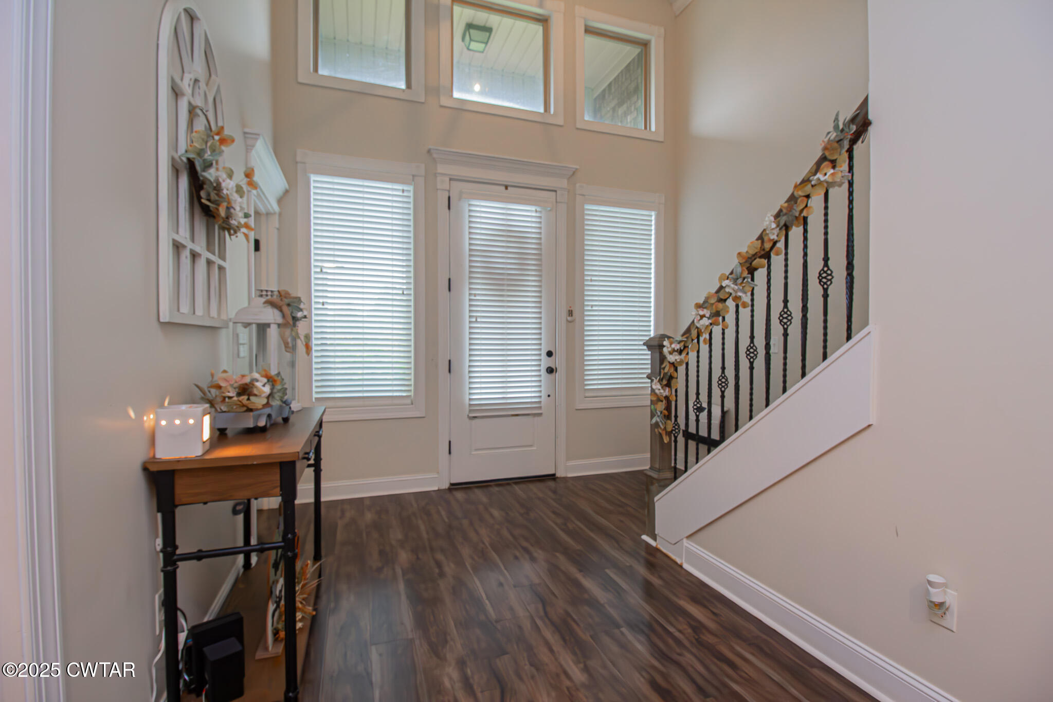 175 Ridgewood Drive Henderson, TN 38340 - Photo 6 of 43 a view of a hallway with entryway wooden floor and front door