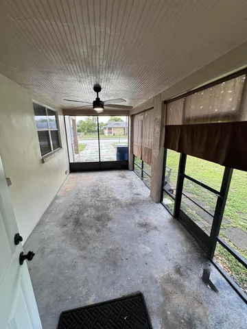 a view of empty room with front door