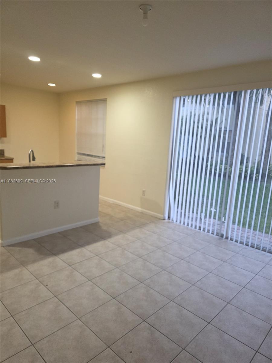2584 Southwest 84th Terrace, Unit 101 Miramar, FL 33025 - Photo 4 of 19 a view of an empty room